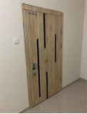 Входные двери в квартиру с МДФ-накладкой