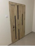 Входные двери в квартиру с МДФ-накладкой